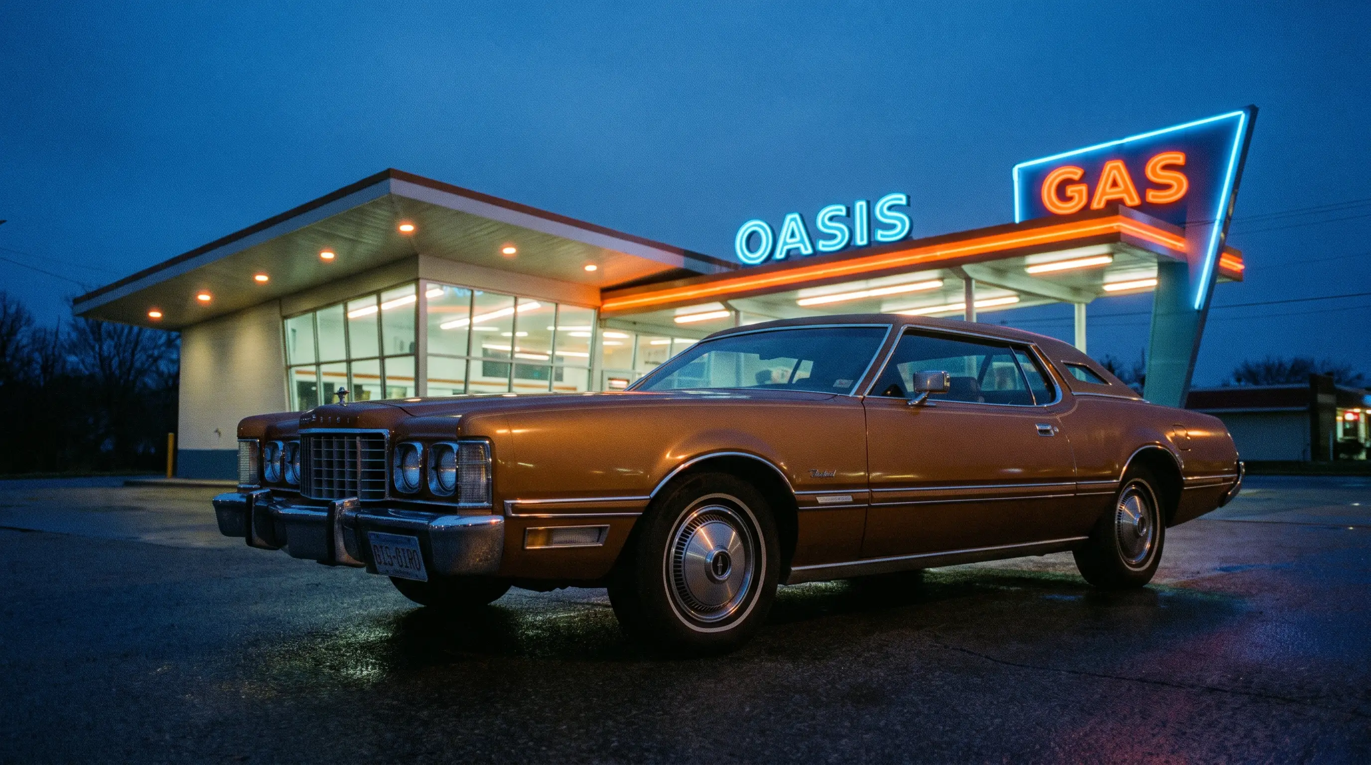 Bronze 1972 Ford Thunderbird Big Bird at a mid century gas station at dusk