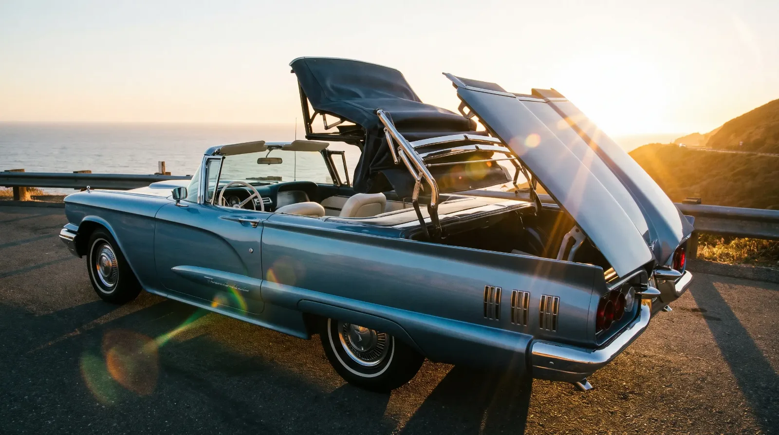 1960 Ford Thunderbird Square Bird convertible with power folding top retracting into the trunk