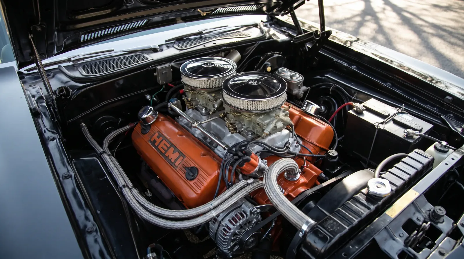 Chrysler 426 Hemi V8 with dual quads in a Plymouth Cuda engine bay