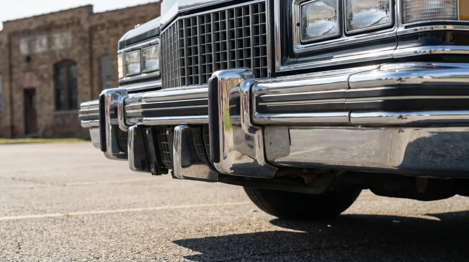 Massive federal 5 mph bumper on a 1970s luxury car front end