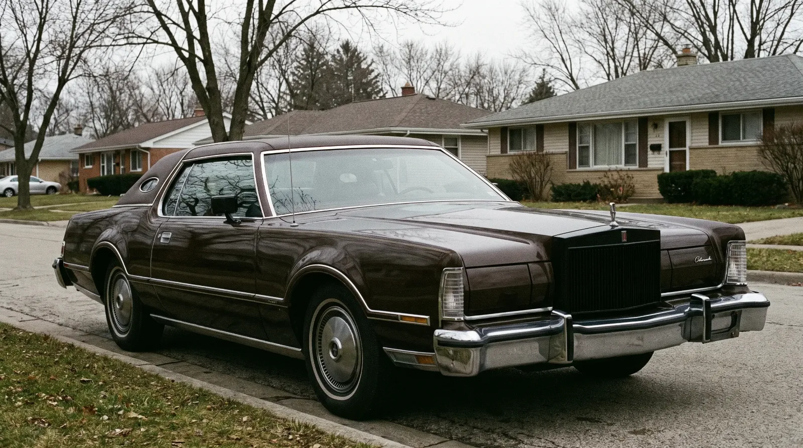 1976 Lincoln Continental Mark IV with heavy federal bumpers, vinyl roof and opera windows, a malaise-era luxury car after chrome fell away