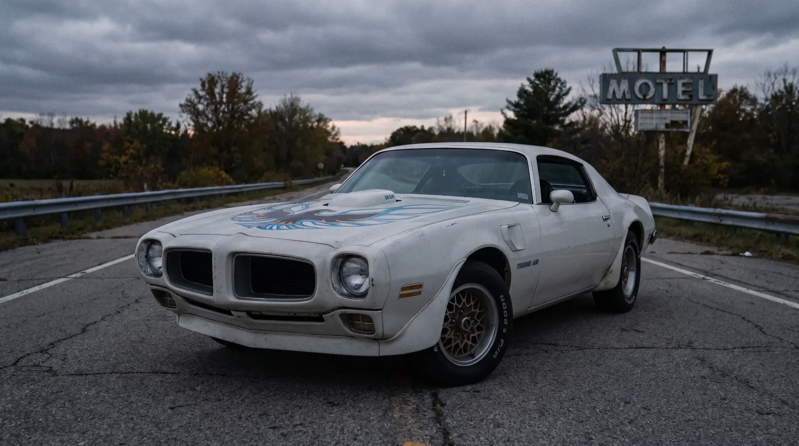 White 1973 Pontiac Trans Am Super Duty 455 with firebird hood graphic