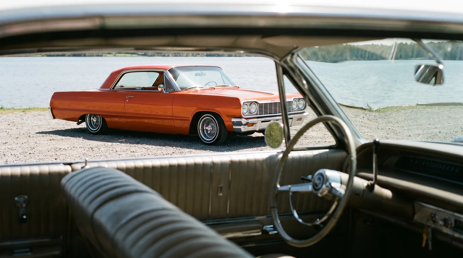 1964 Chevrolet Impala lowrider, seen from inside another Impala