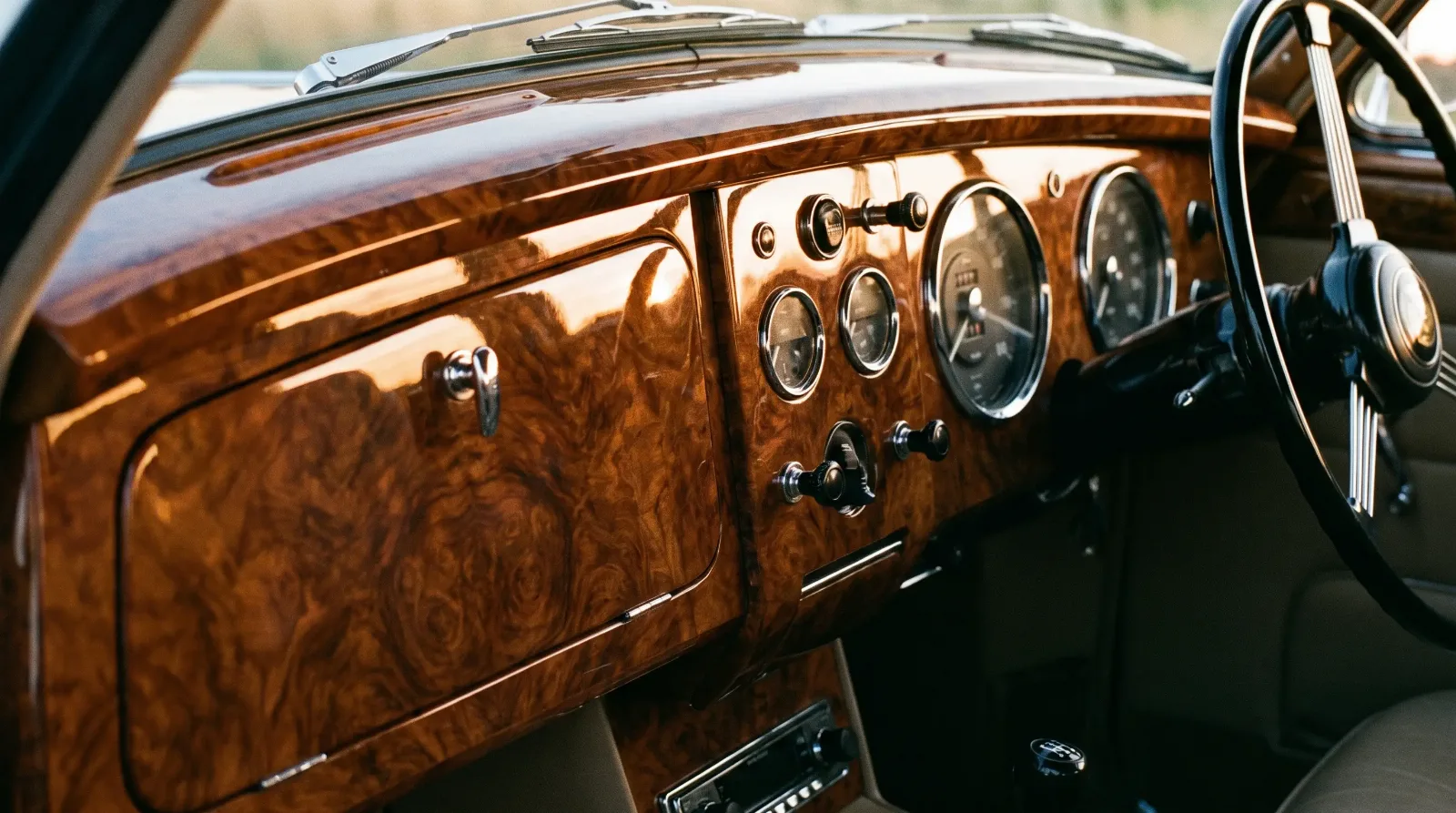 Restored burl walnut dashboard veneer with book-matched grain
